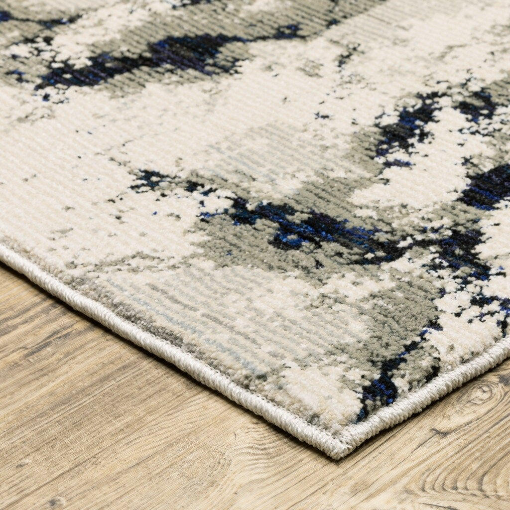 9' X 12' Grey Black And Ivory Abstract Power Loom Stain Resistant Area Rug - 3'6